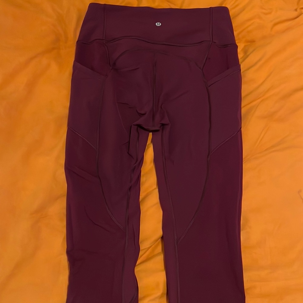 Purple lululemon leggings with side pockets size 10